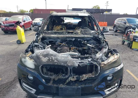 2014 BMW X5 Sdrive35I z USA, uszkodzony, nr VIN 5UXKR2C53E0C01370